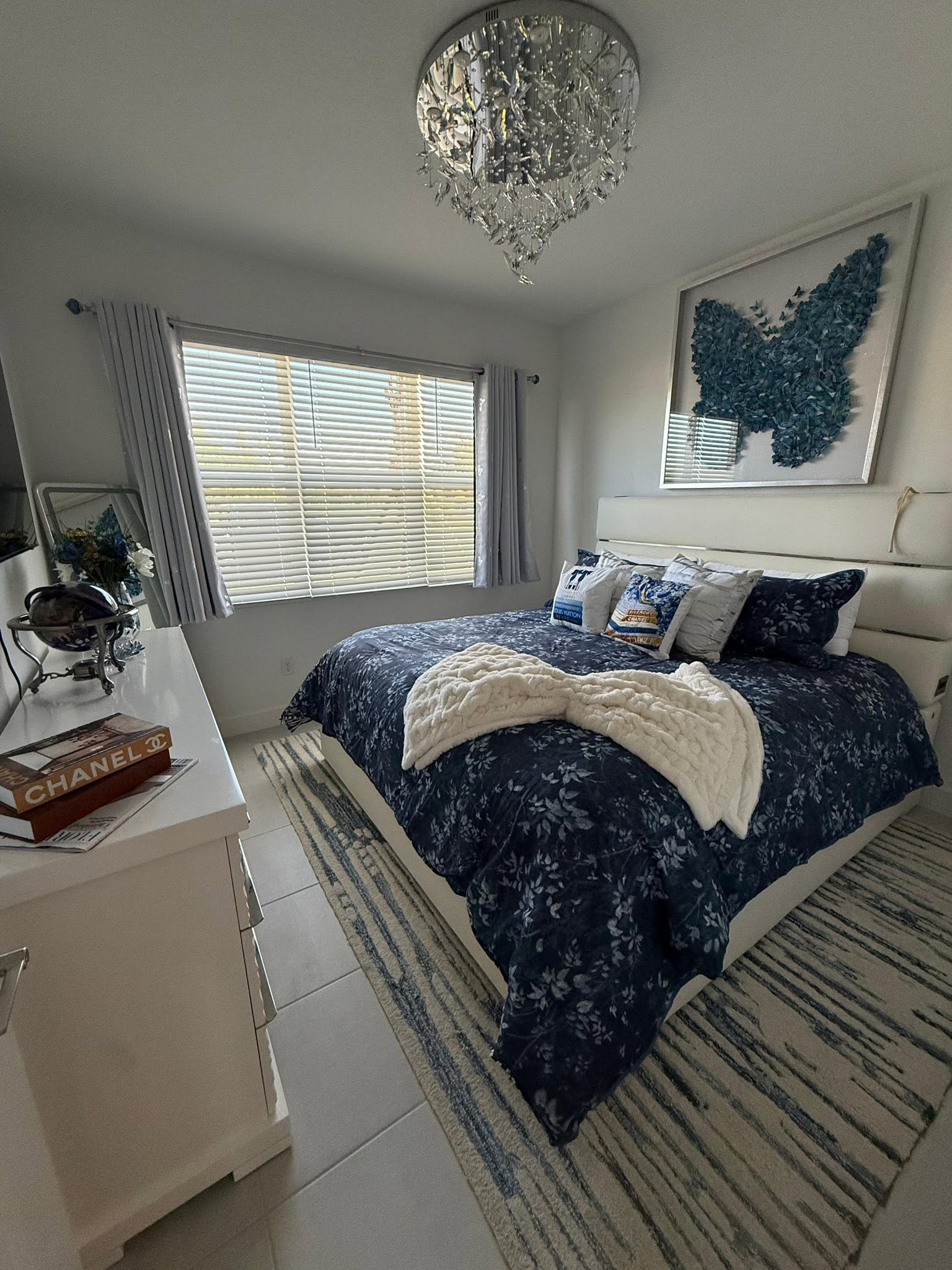 Clean blue and white bedroom